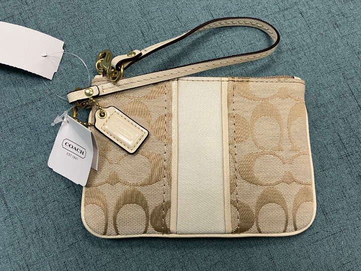 Tan+ Coach wristlet, XS