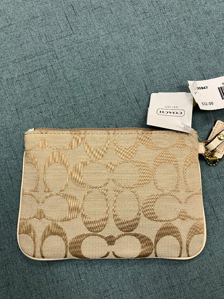 Tan+ Coach wristlet, XS
